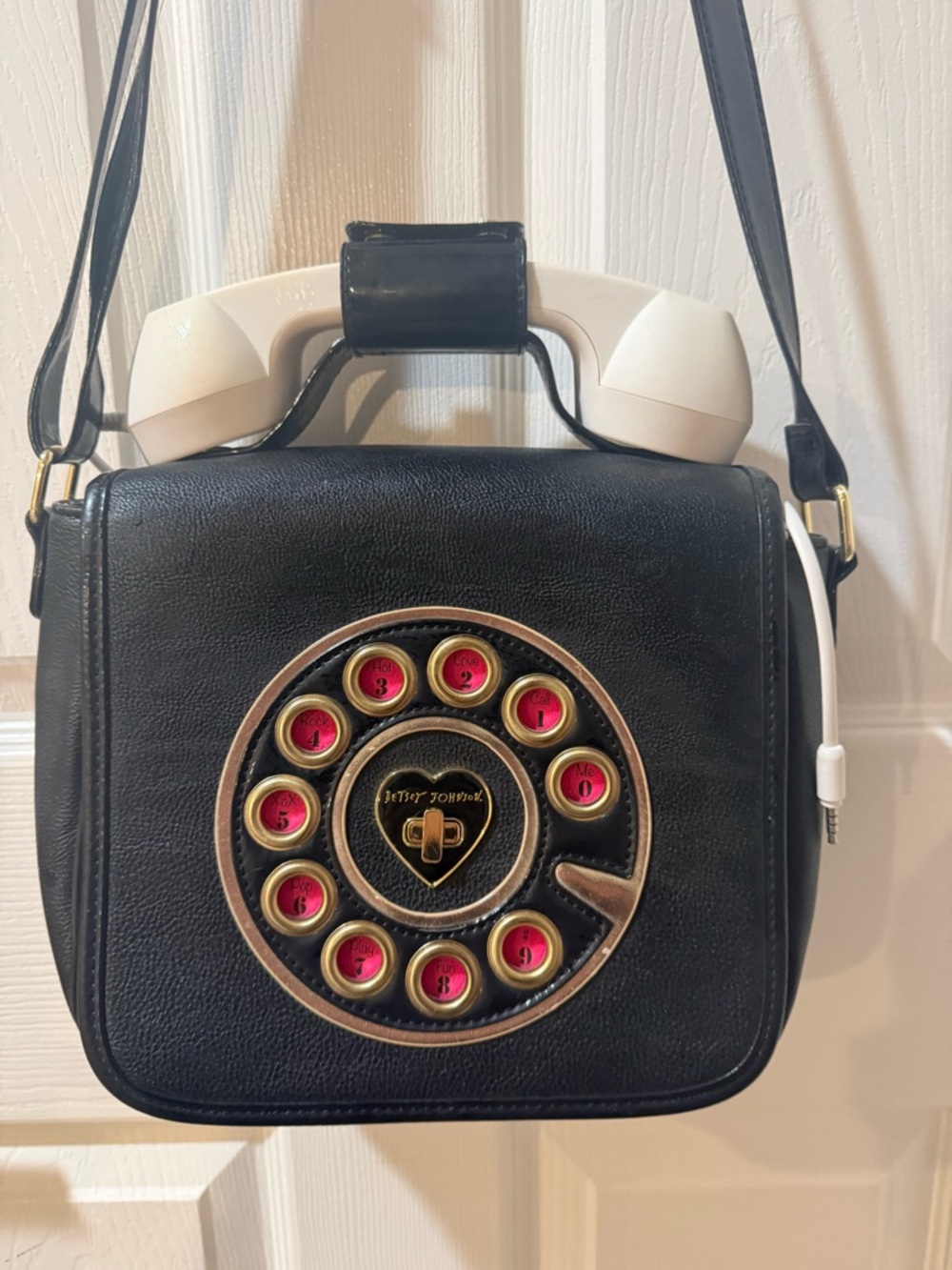 Betsey Johnson Black Crossbody Bag with Pink Dial Accents